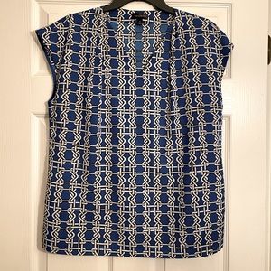 The Limited Brand V-Neck Blouse. Blue with White design. Size Medium